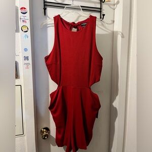 Express- size 14- red romper, back zip/ tie, pockets/cutouts. NWT.